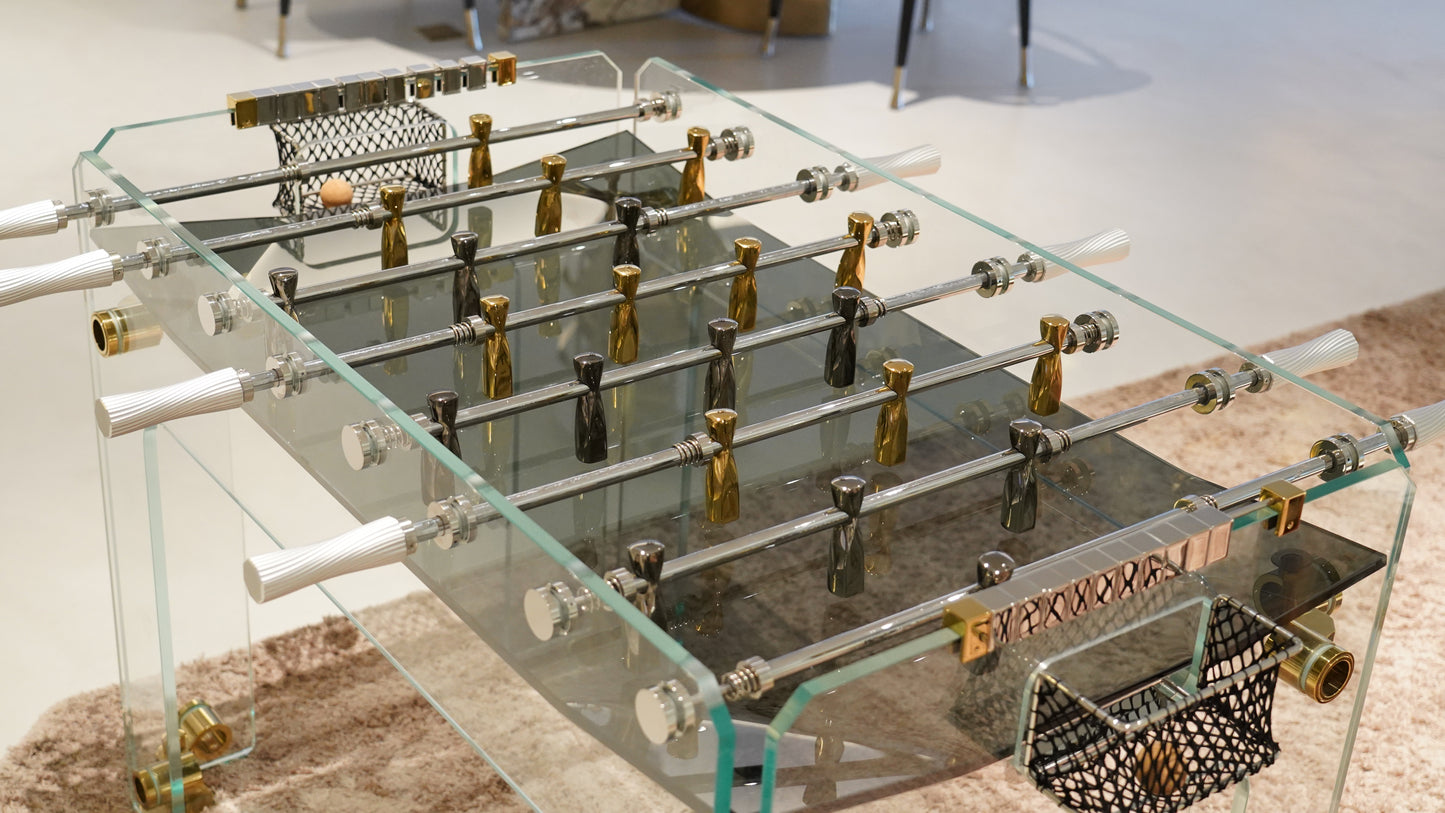 Mesa de fútbol con accesorios de cristal dorado