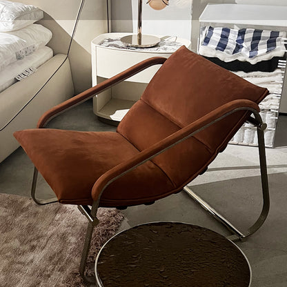 Orange brushed leather stainless steel armrests and backrest chair with woven bottom detail