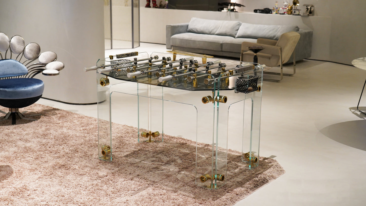 Mesa de fútbol con accesorios de cristal dorado