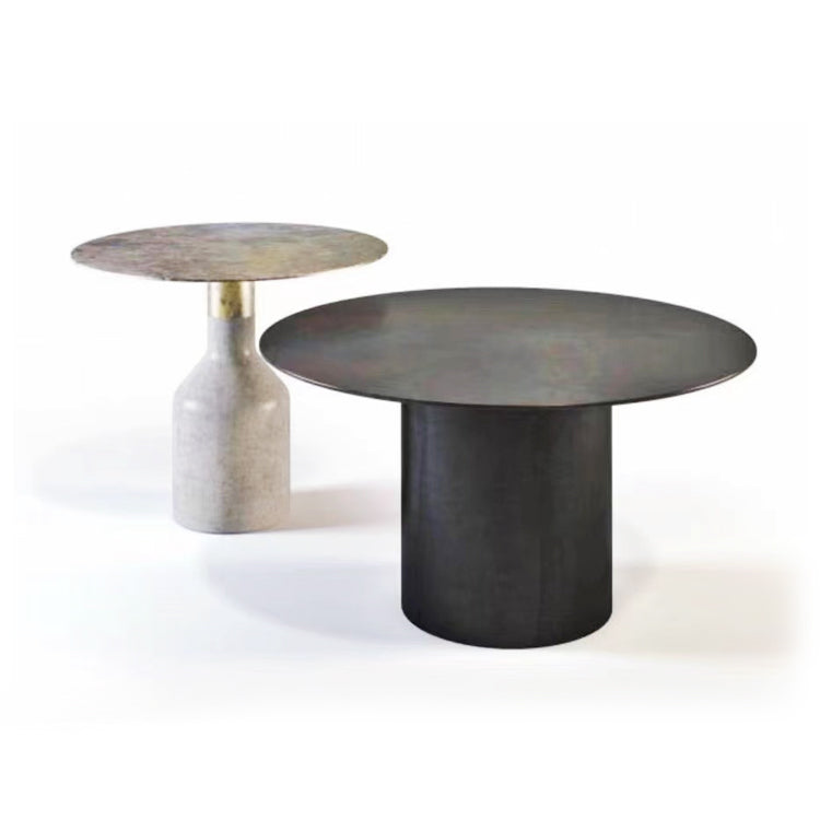 Mesa de centro redonda con base de mármol y tapa de acero inoxidable