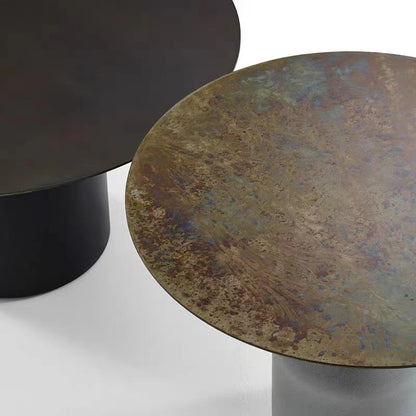 Mesa de centro redonda con base de mármol y tapa de acero inoxidable