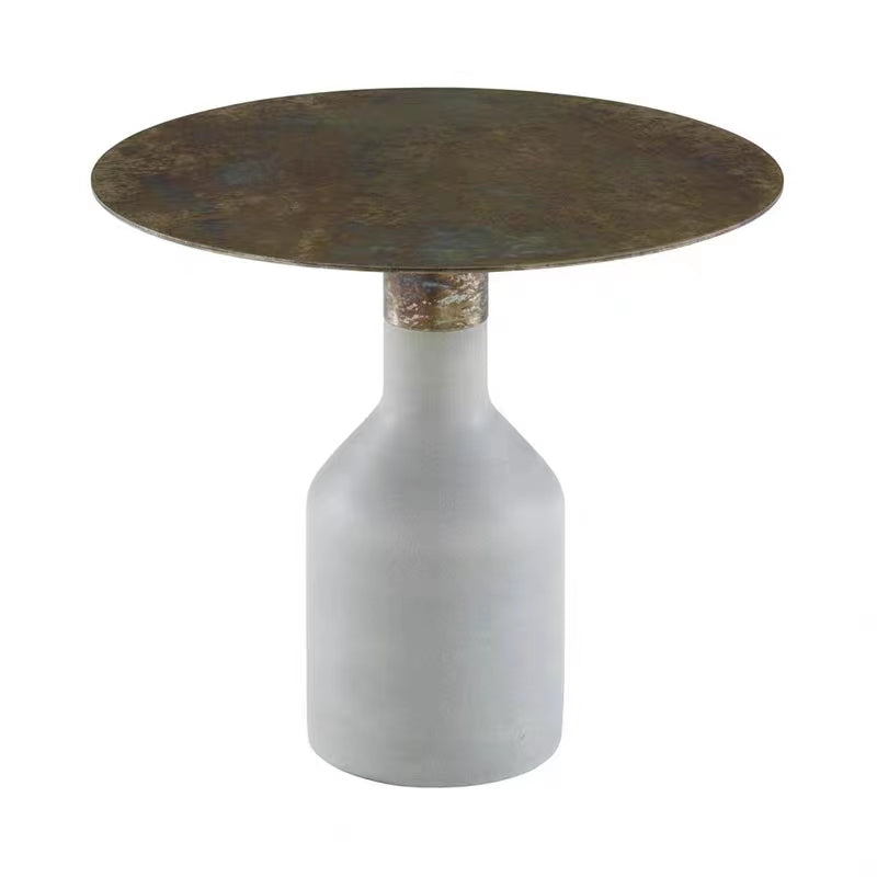 Mesa de centro redonda con base de mármol y tapa de acero inoxidable