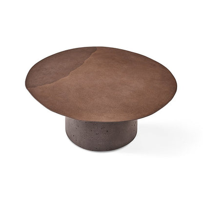 Mesa de centro antigua de acero inoxidable con forma redonda irregular