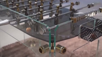Mesa de fútbol con accesorios de cristal dorado