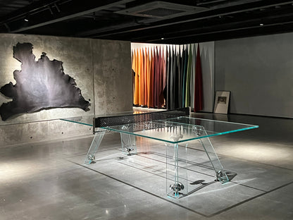 Mesa de ping pong de cristal, apta para interior y exterior.